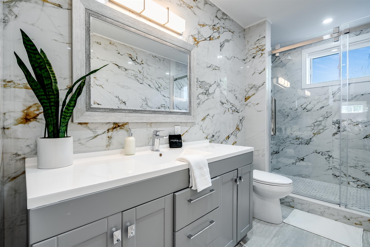 A bathroom where glamour meets calm.