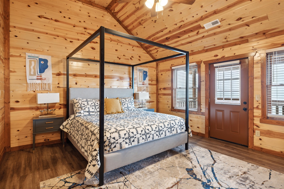 King bedroom with TV and full ensuite bathroom.