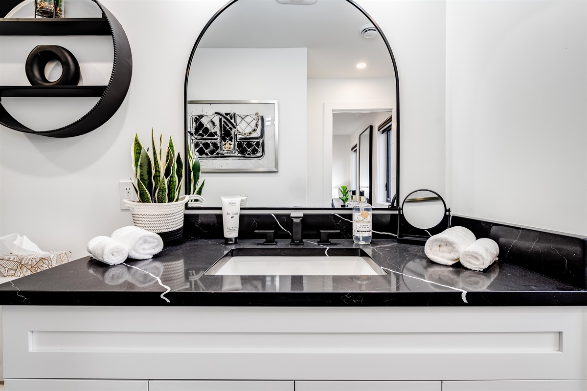 Full Bathroom Warm accent lighting highlights architectural details.