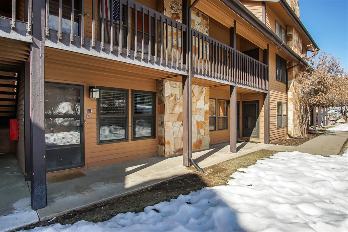 Convenient ground-level access with classic mountain lodge architecture.