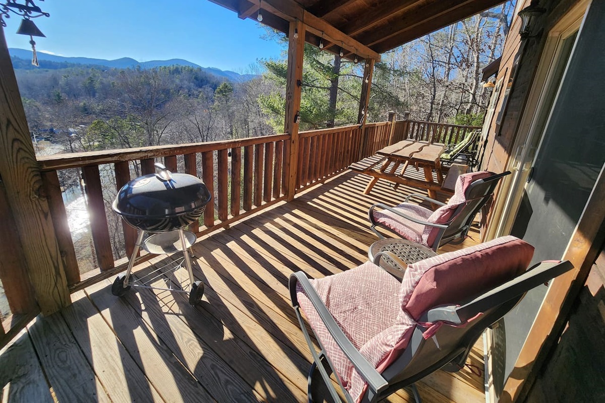 Upper level back deck, fully enclosed with view of river 
