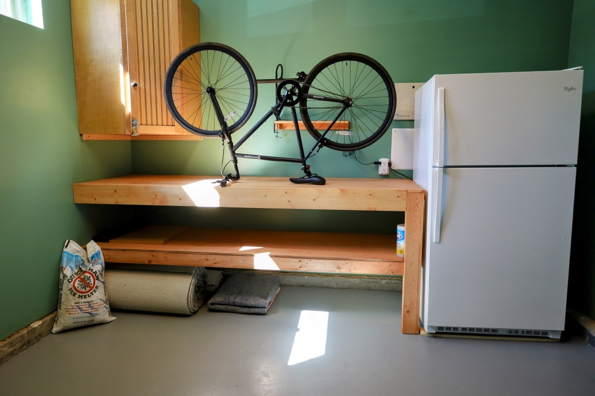 South Garage with ski/bike tuning workbench and extra refrigerator