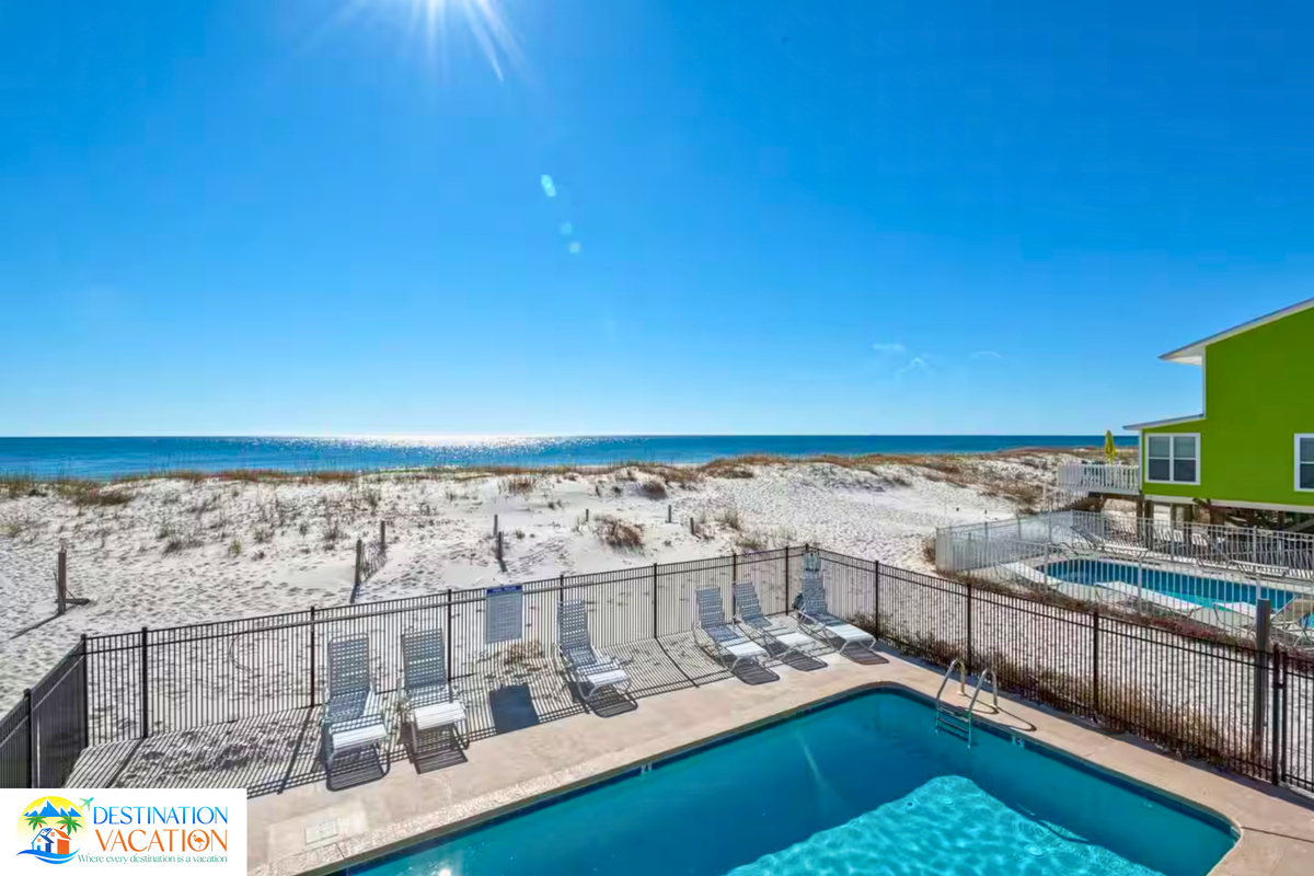 Poolside relaxation meets endless Gulf views.