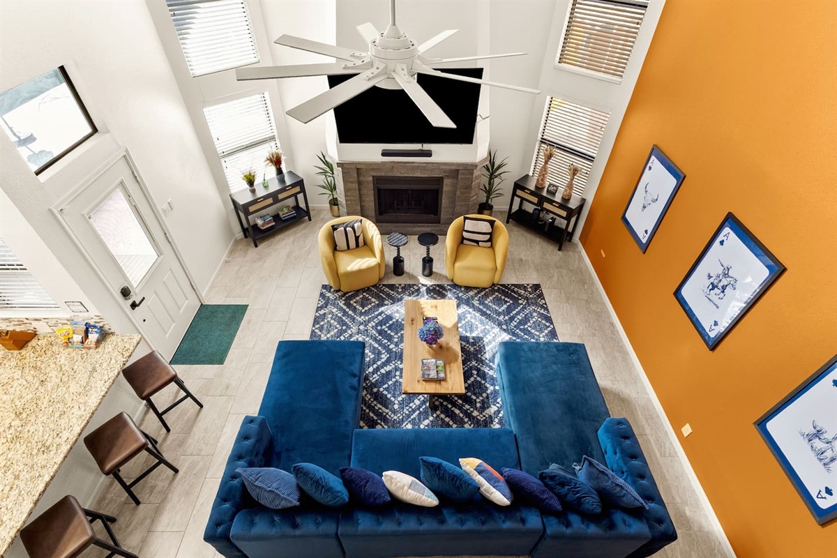 Spacious & Stylish Retreat! Gather in this open-concept living space with a cozy fireplace, plush seating, and sleek design.Perfect for team meetings, family bonding, or unwinding after a day of fun. Luxury, comfort, and connection start here! ✨