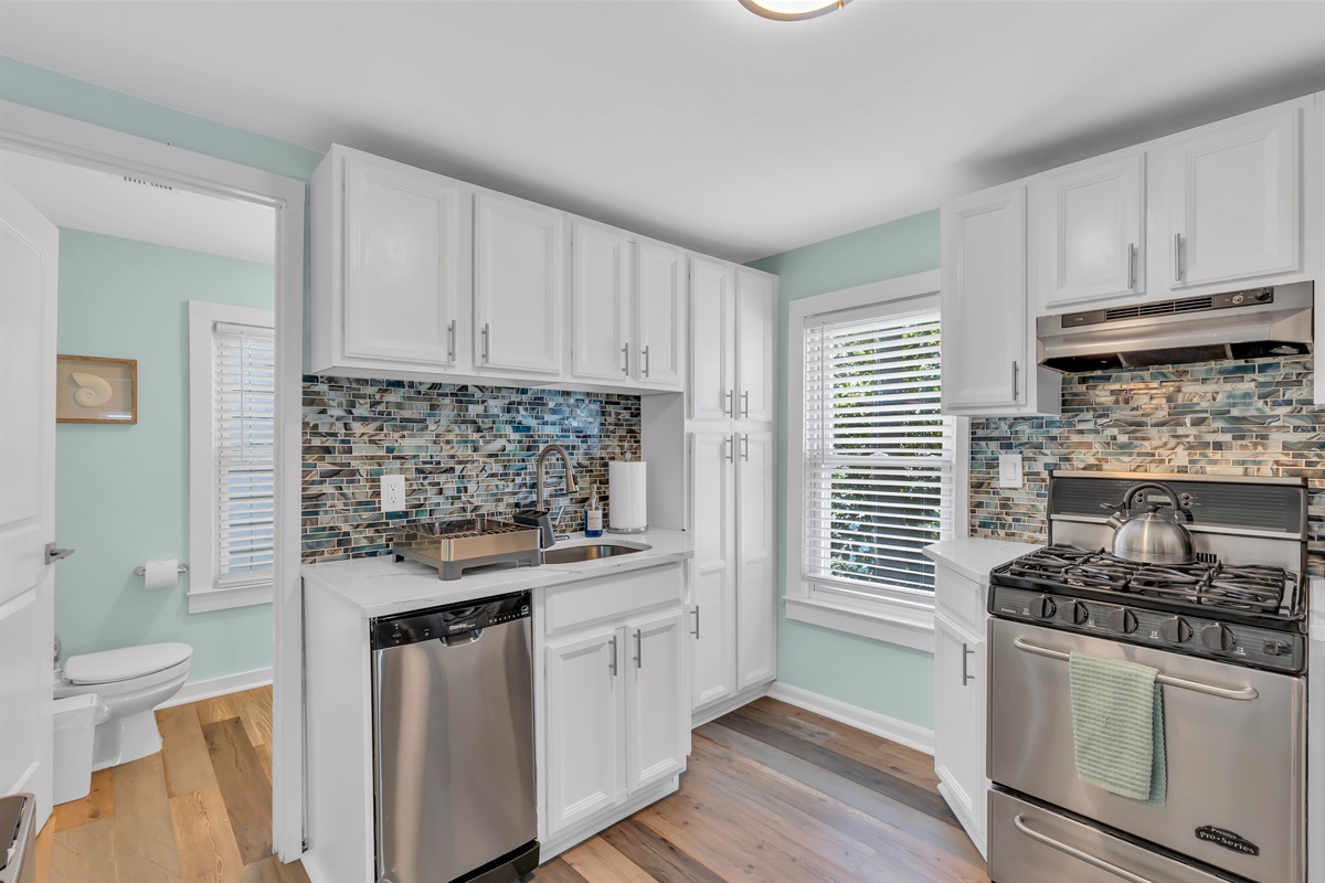 Updated kitchen with the essentials such as dish soaps, paper towels, trash bags and sponges to make arrival stress free.