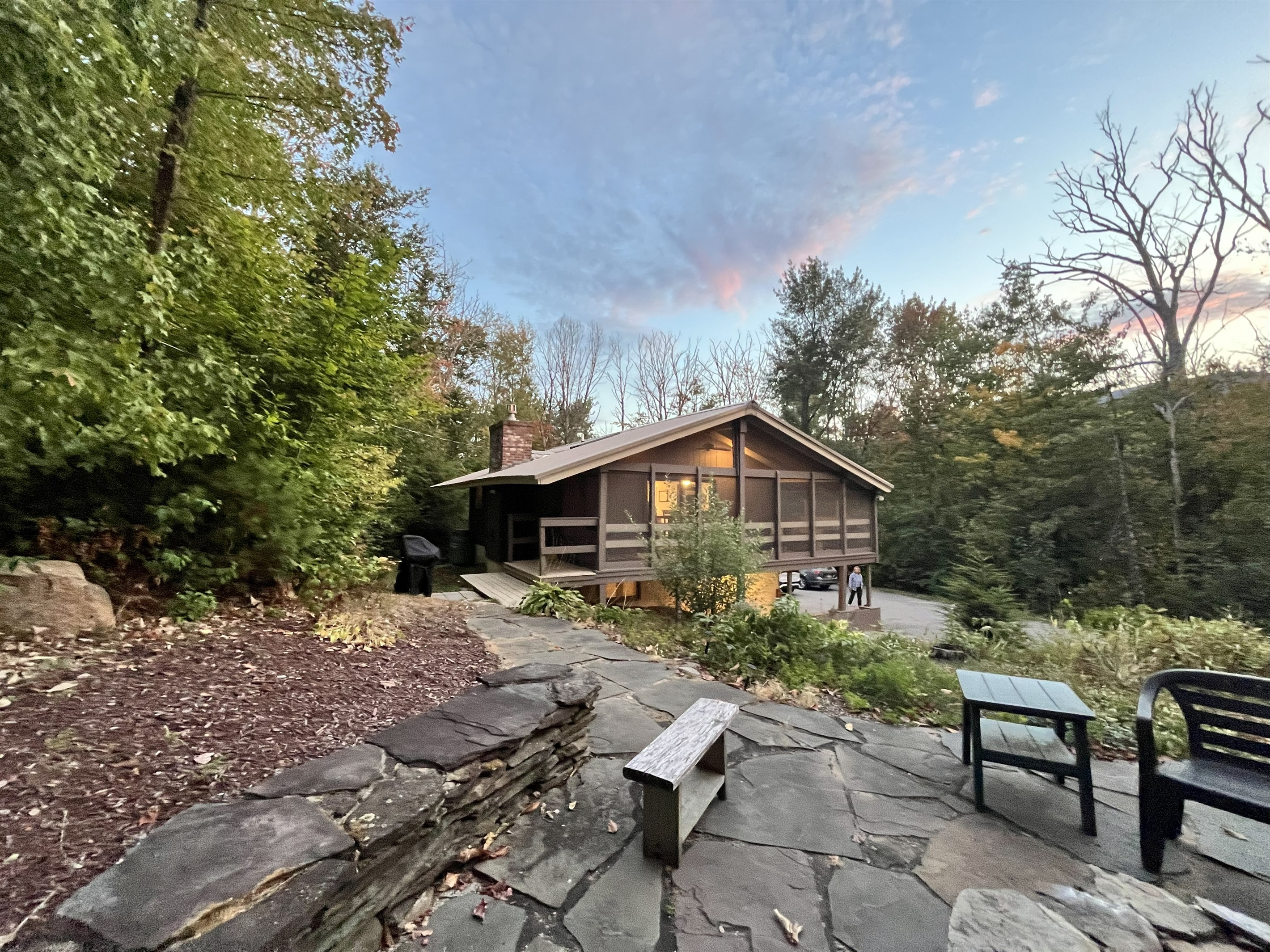 Stone fire pit & patio – Gather under the stars for s’mores and stories