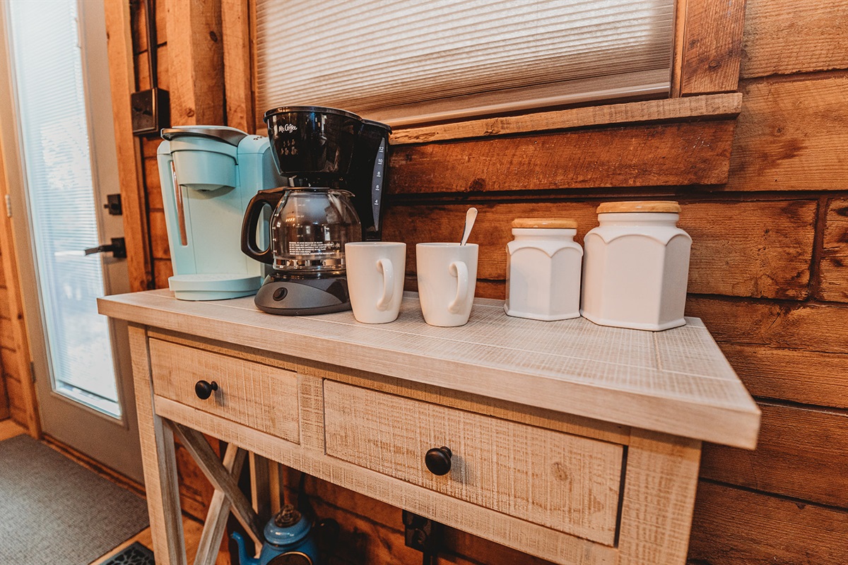 Start your day with the Coffee Bar featuring Drip & Keurig Coffee Makers with ground coffee, coffee filters, sugar and creamer packets provided for your stay.