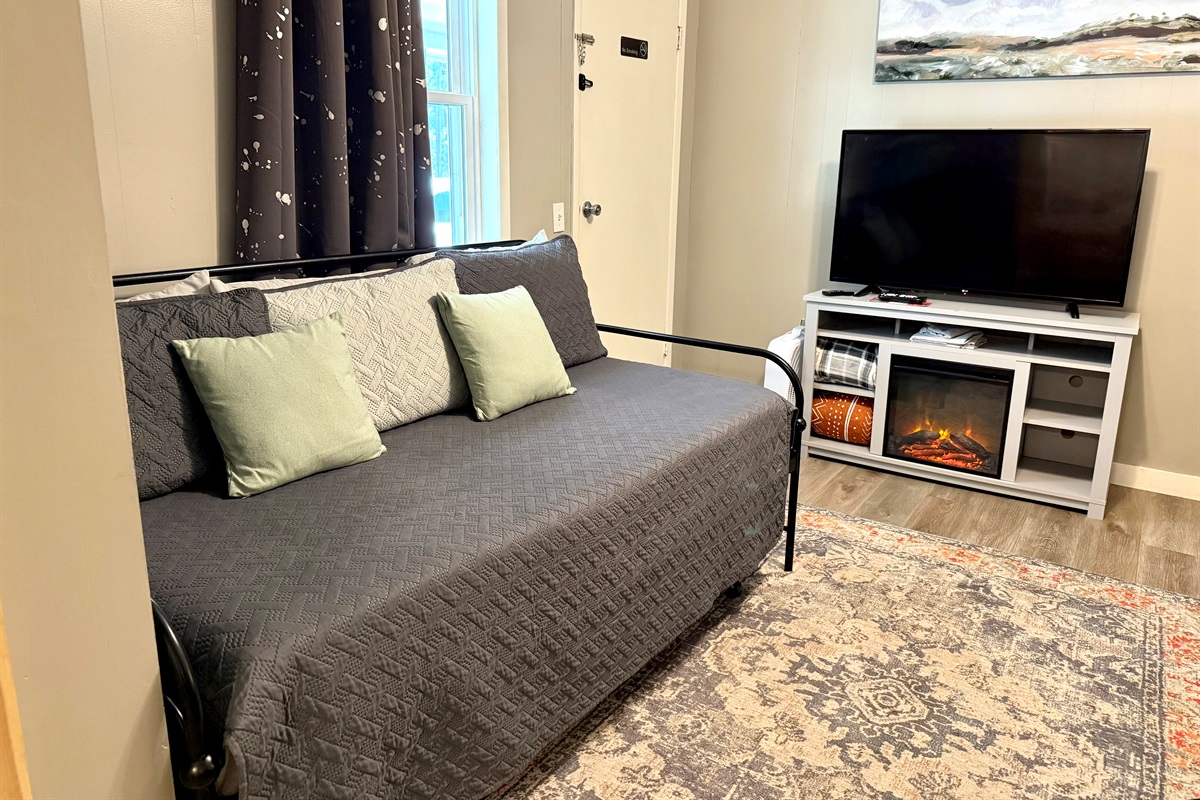 Electric fireplace for ambiance.