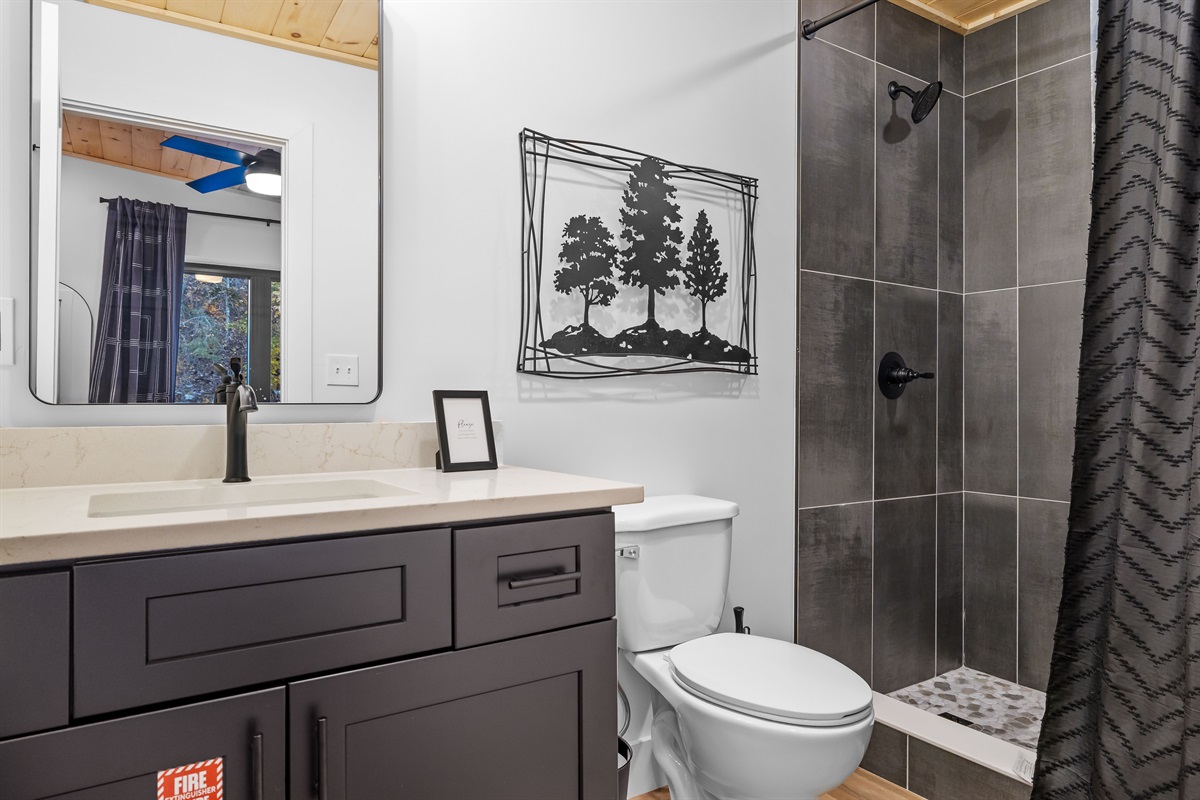Upstairs full bath with walk-in shower.