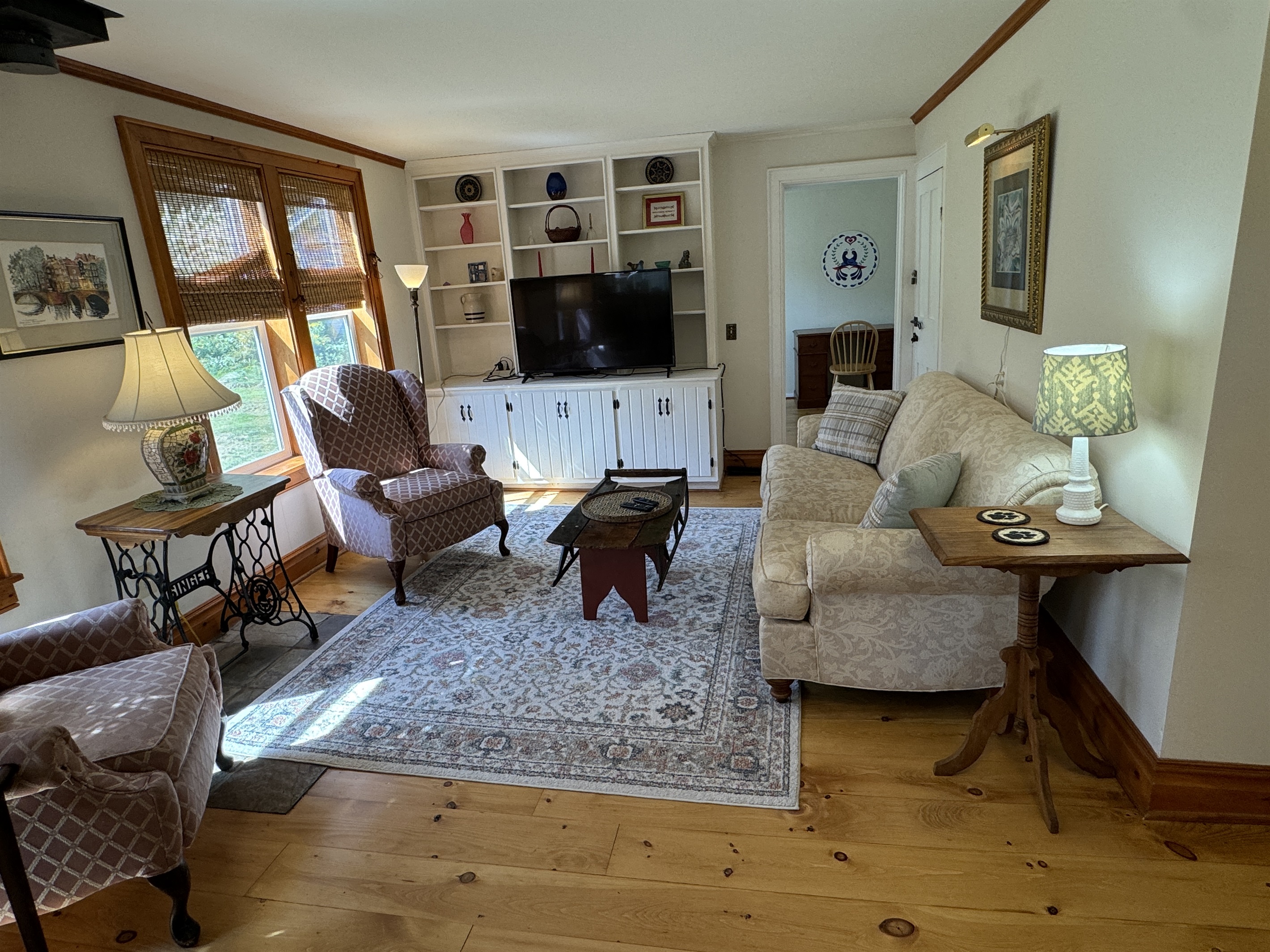Living room with Queen bedroom in back right
