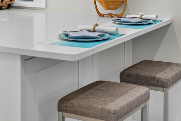 Convenient breakfast bar with comfortable seating—ideal for morning coffee or casual dining.