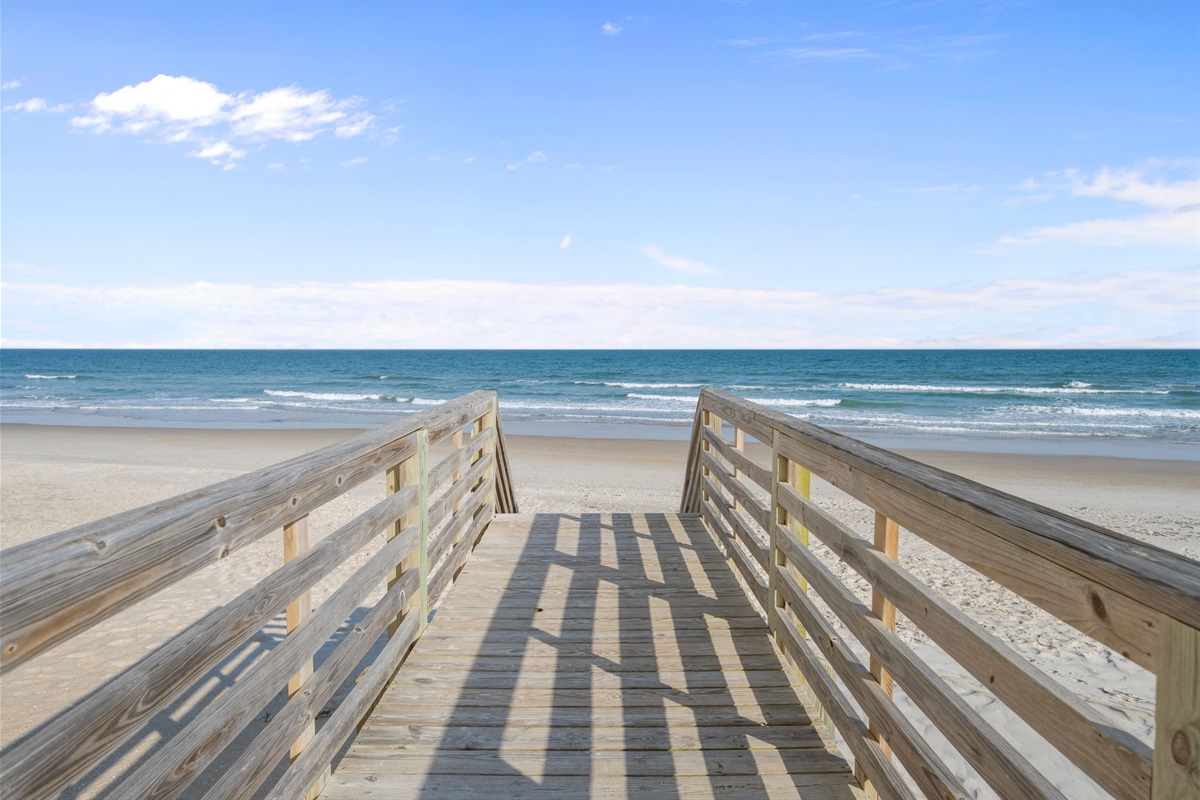 Direct boardwalk path leading you straight onto the sandy shoreline