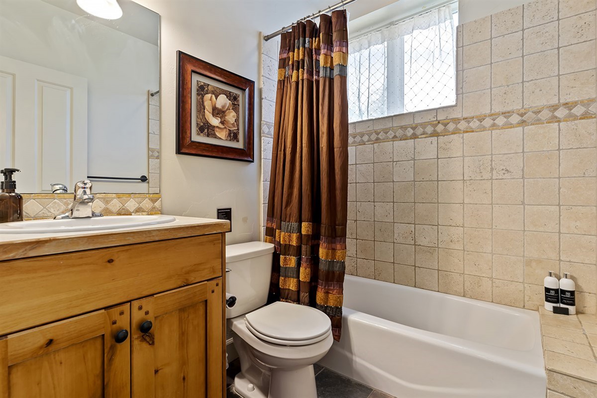 Refresh after a day of adventure in this full bath