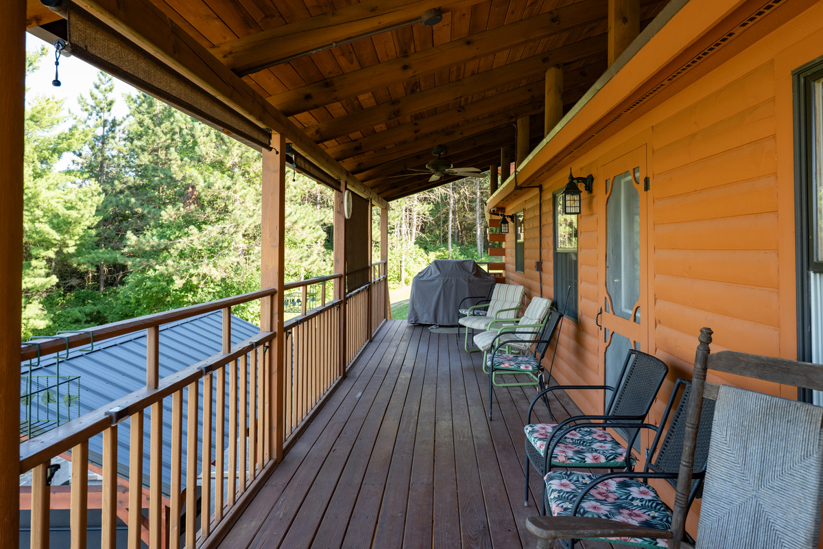 Covered porch with multiple chairs