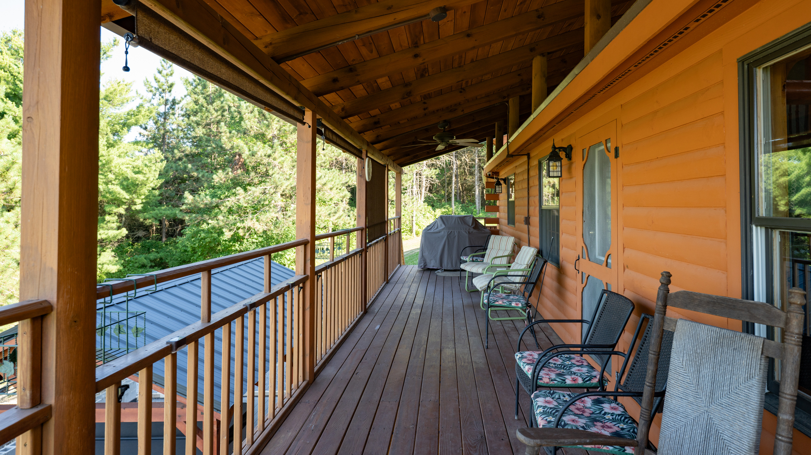 Covered porch with multiple chairs
