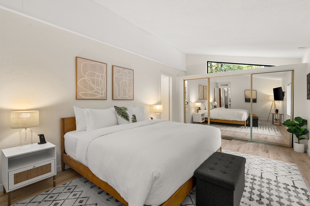 Sink into the plush king bed and let the quiet, meadow-like backyard be your morning backdrop