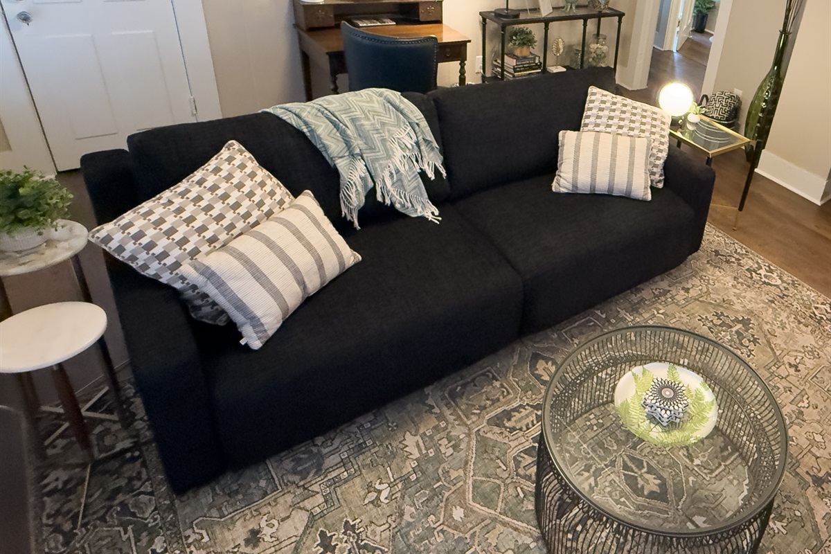 Comfy couch converts to a queen size bed.