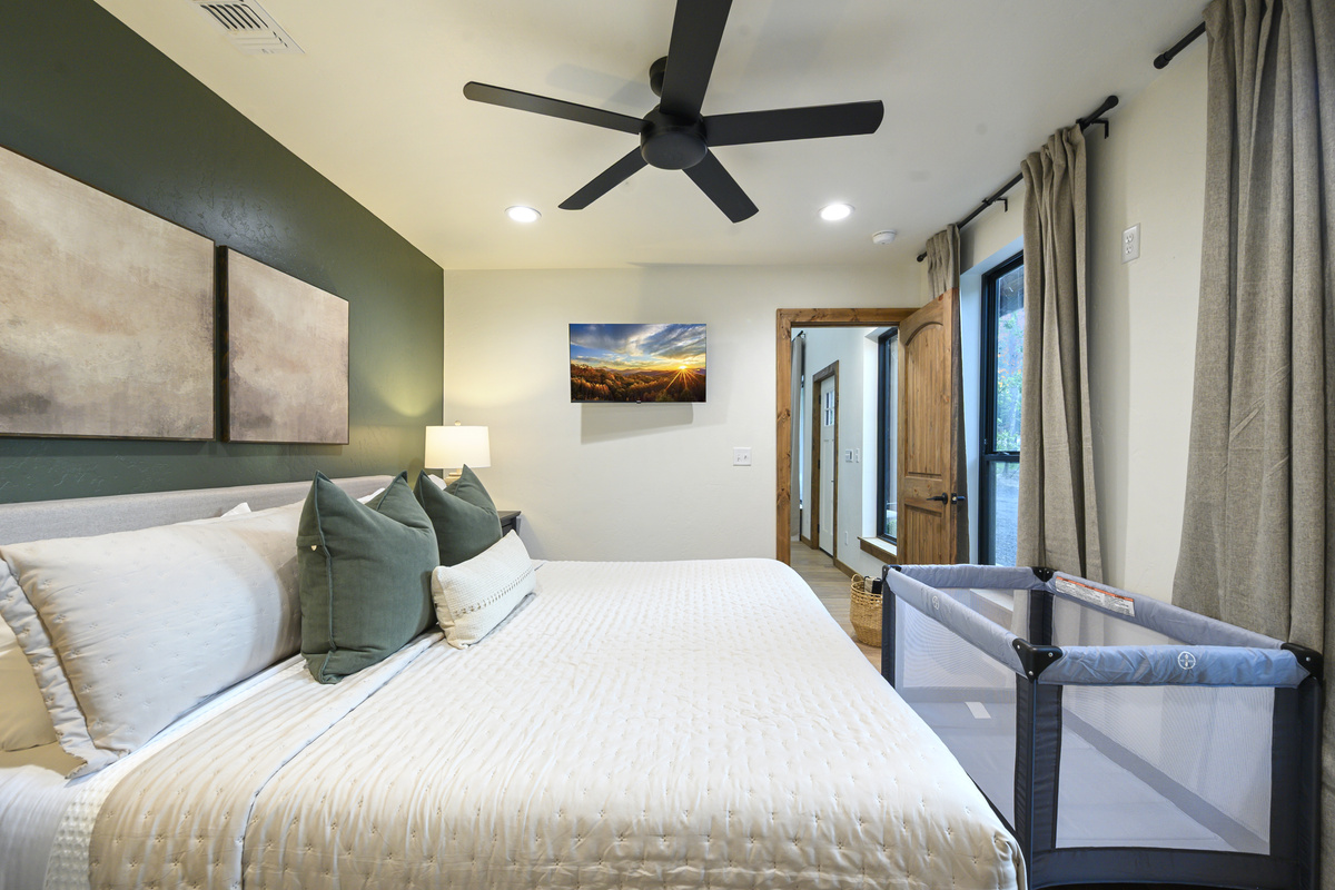 A serene king retreat designed for quiet nights and slow mornings in the pines.
