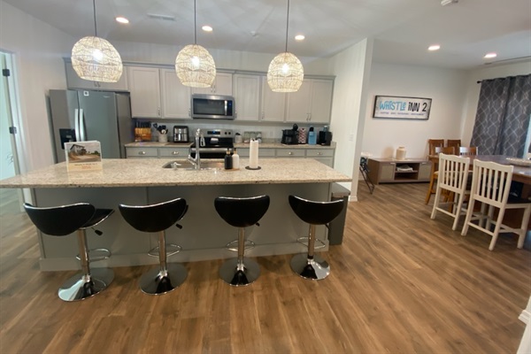 Gourmet kitchen with granite island in a downtown Branson vacation home