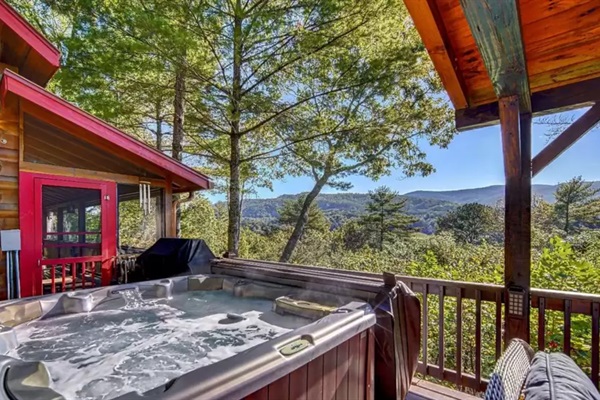 Enjoy beautiful mountain views year-round from the outdoor hot tub!