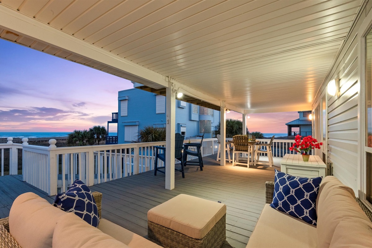 An expansive porch offers the ideal spot to take in sweeping Gulf views and coastal breezes.