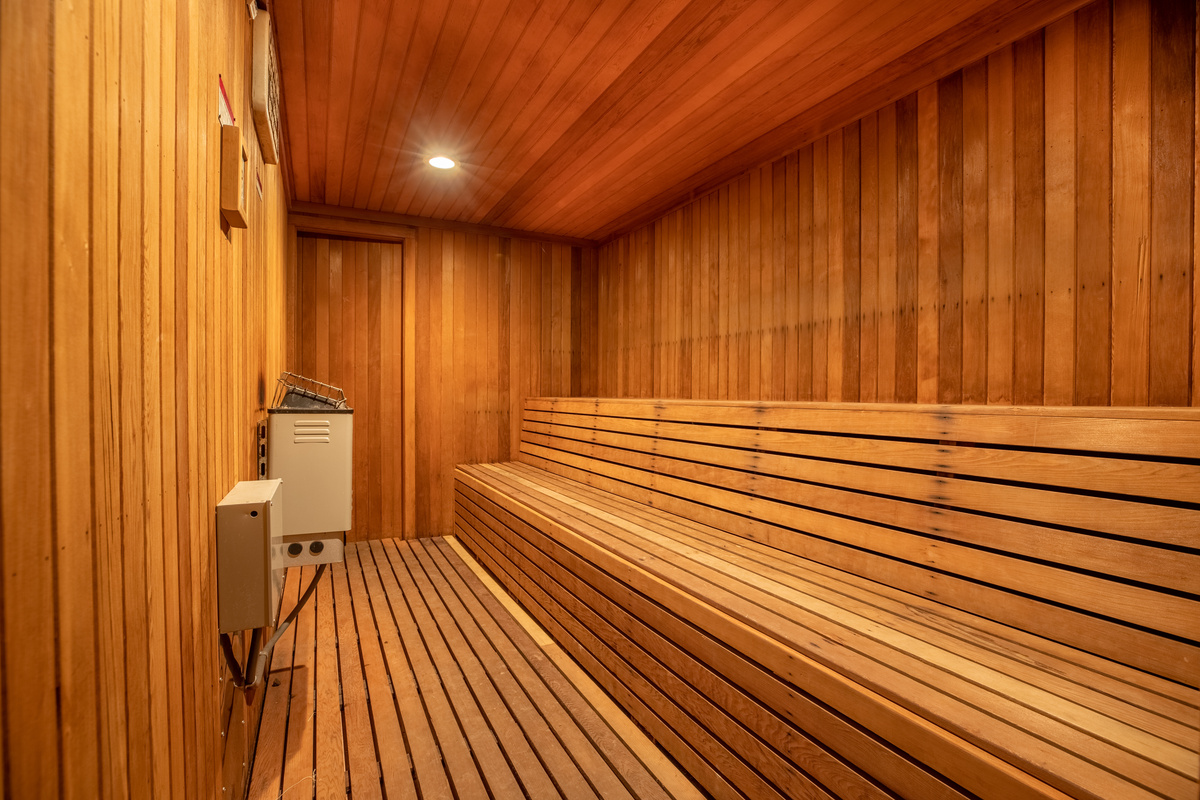 The pool complex includes hot tub and sauna for a relaxing retreat.