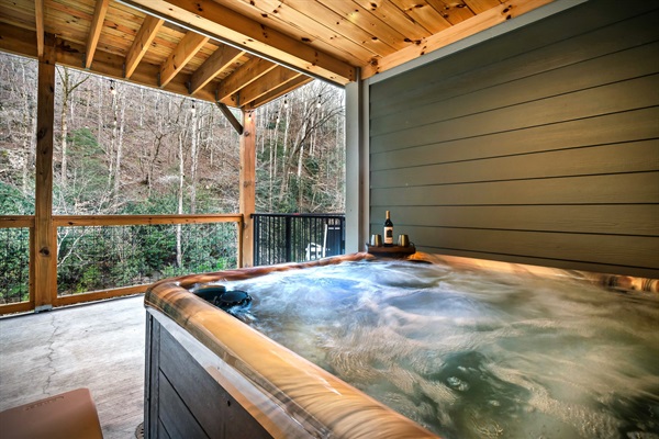 You've arrived at your haven! Relax in the hot tub while the sound of the river below brings peace to your body, mind, and soul. This is pure therapy!