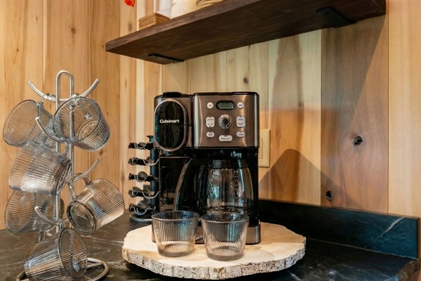 Start your mornings right with a freshly brewed coffee from this charming coffee station.