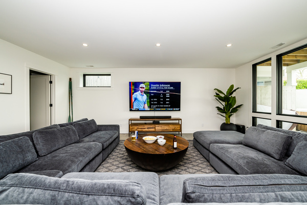 Large sectional and 84" flatscreen