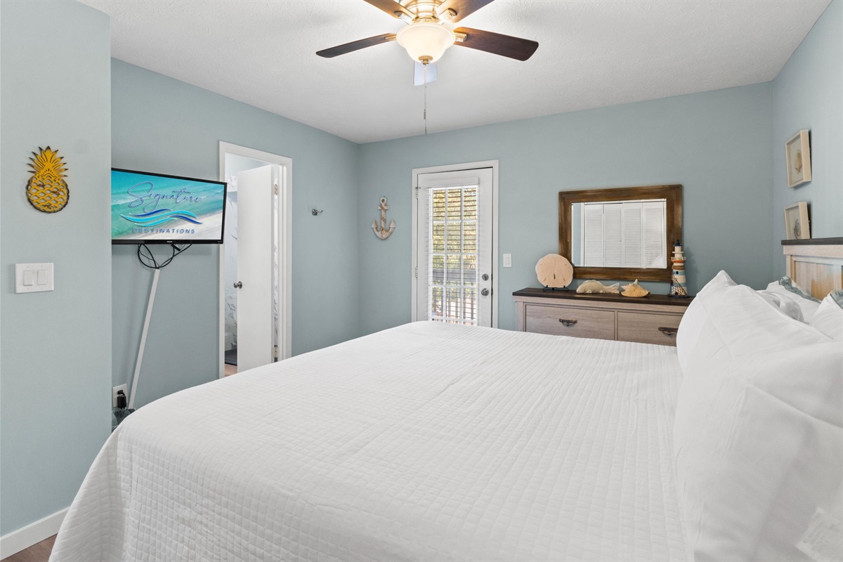 Master Bedroom with King Bed and Balcony Access