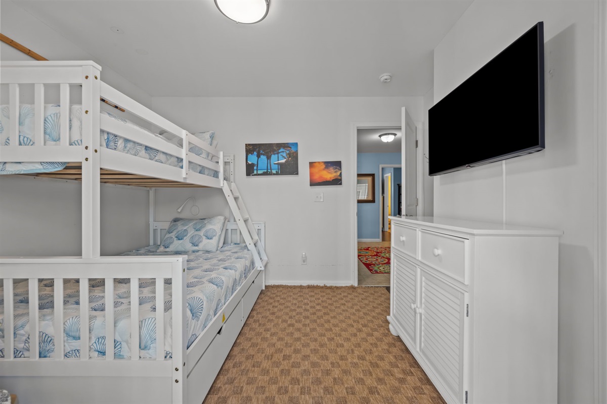 Kid's bedroom features a large Smart TV