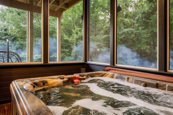 Relax in the Private Hot Tub on the Enclosed Screened Porch—Year-Round Comfort Surrounded by Smoky Mountain Scenery.