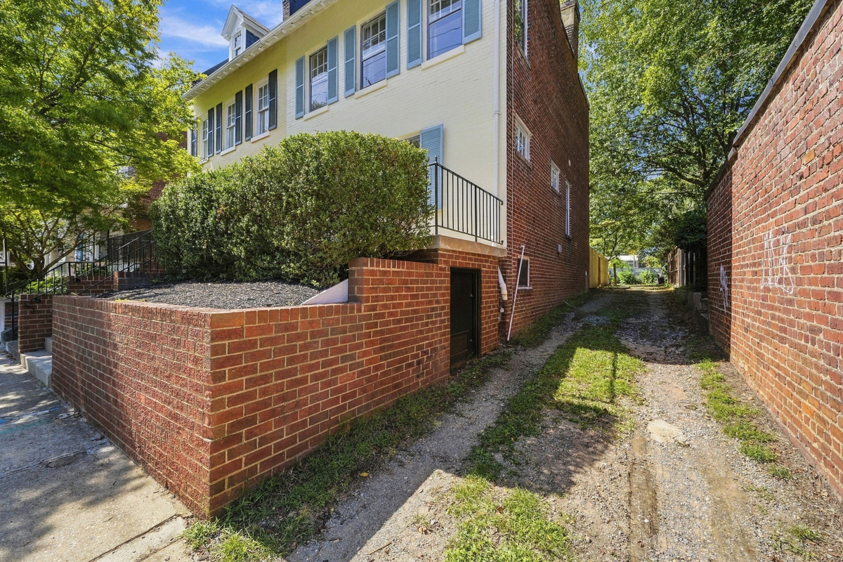 Exterior Charm: Explore the stunning architecture and lush greenery just steps from your door!