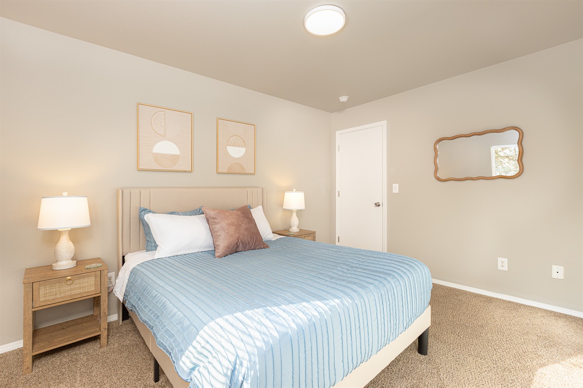 3010 Regan – Bedroom One
Cozy bedroom with comfortable bedding.