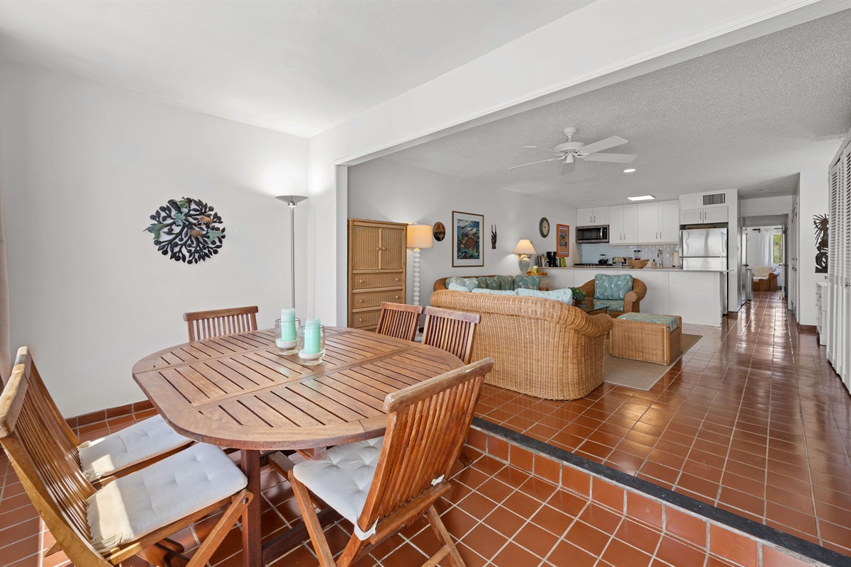 Open concept living and dining space allows the natural light to flow throughout.