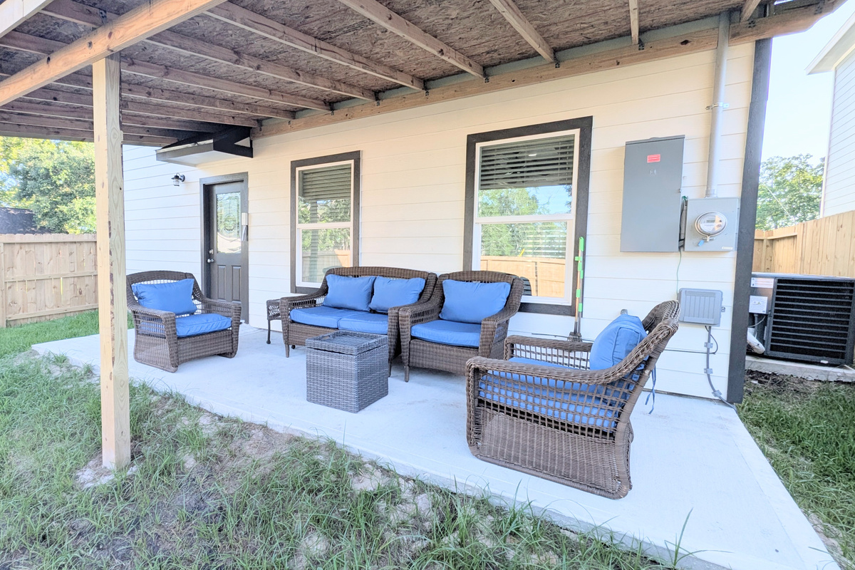 Unwind after a long day or enjoy your morning coffee on this large covered patio. 