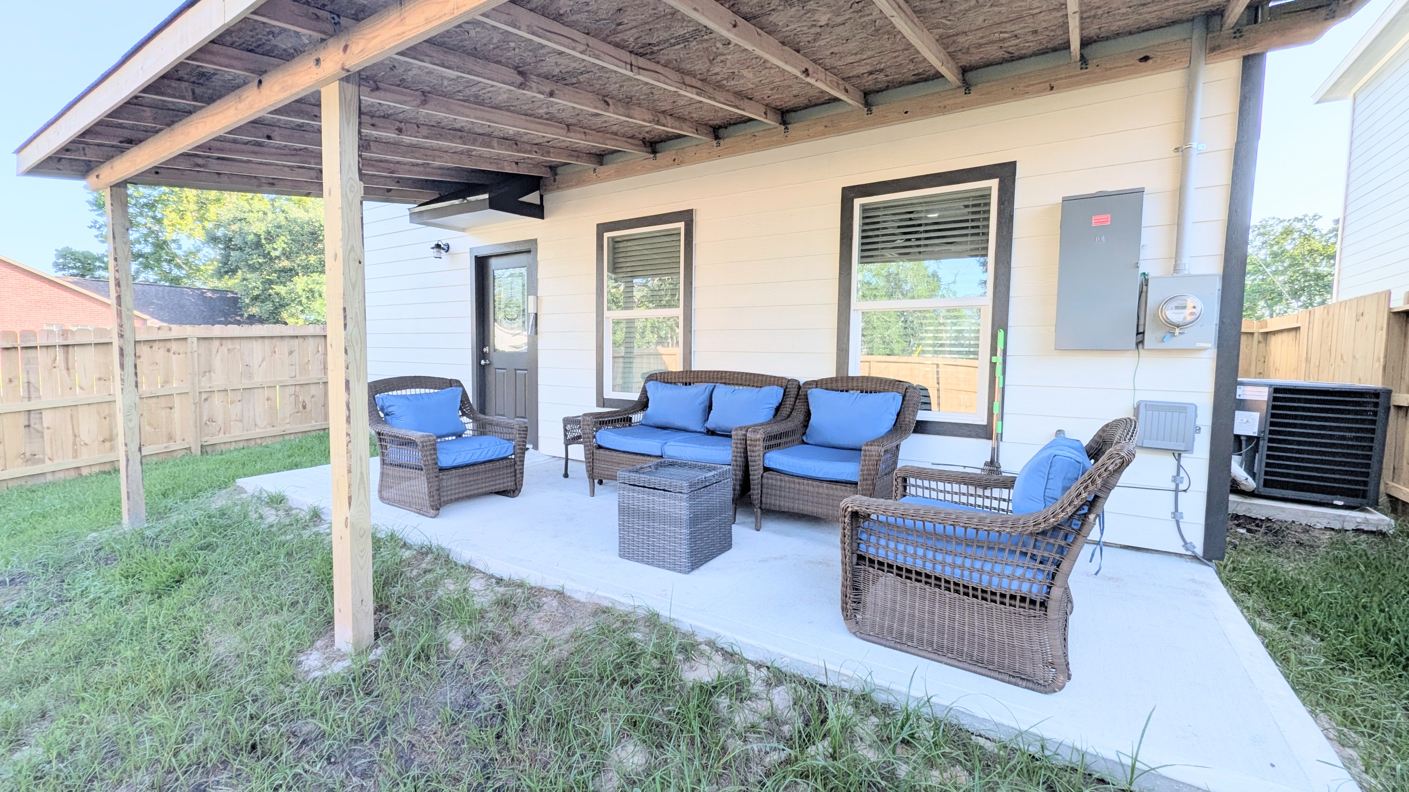 Unwind after a long day or enjoy your morning coffee on this large covered patio. 