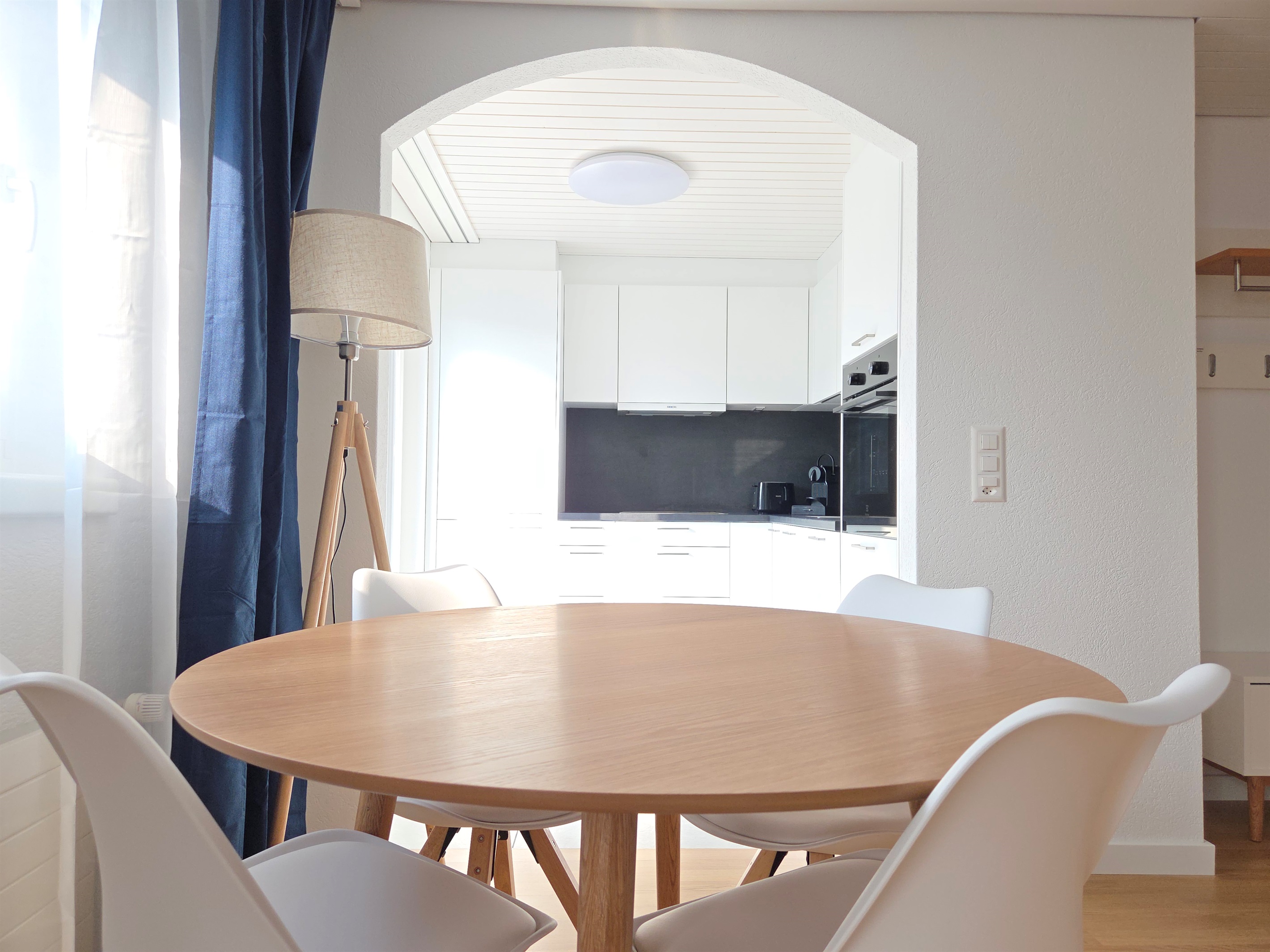 Dining area between kitchen and living room