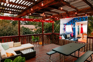 Alfresco Cinema Delight – Experience outdoor movie magic with our projector and comfy seating.