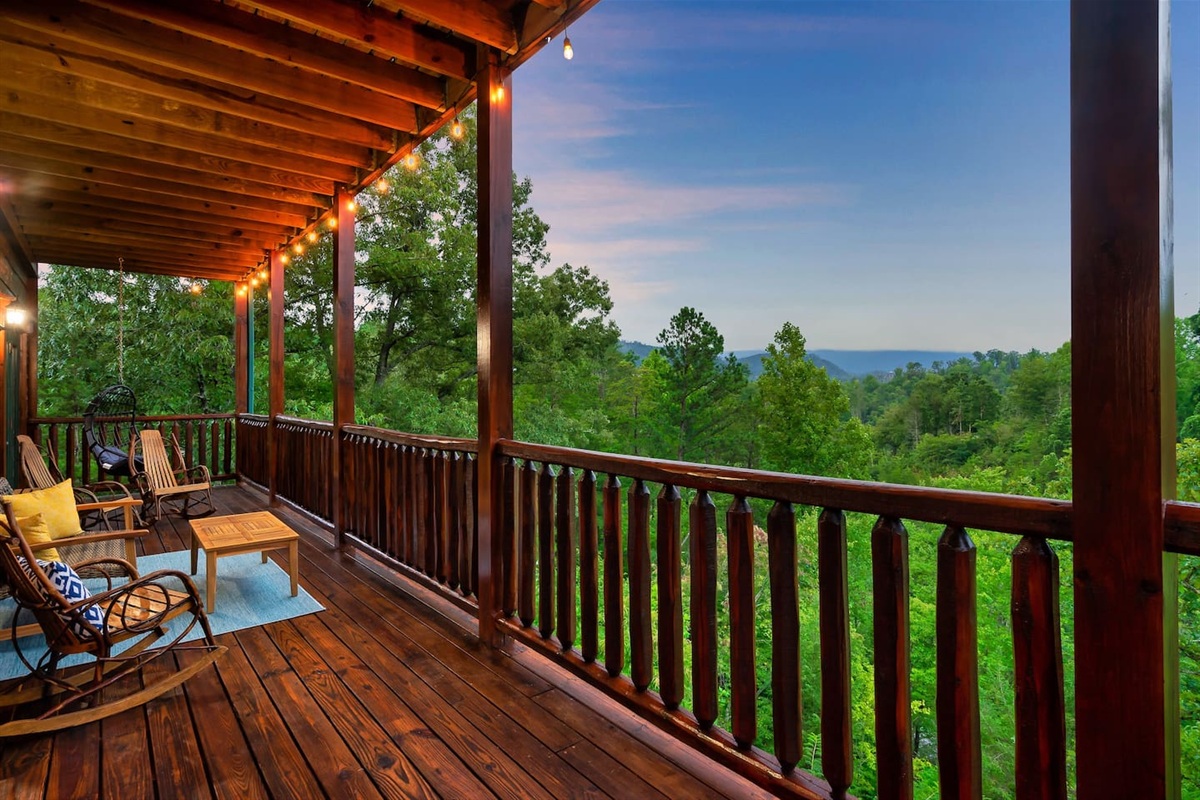 Peace & relaxation await | Swing, rock & take in the mountain scenery from the mid-level porch