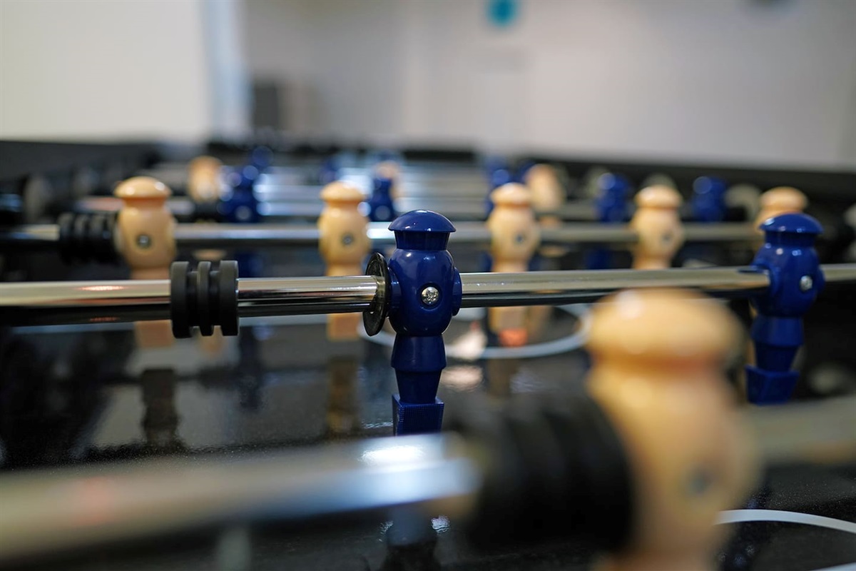 Air conditioned and heated garage space includes tons of games like foosball, air hockey, and shuffleboard.