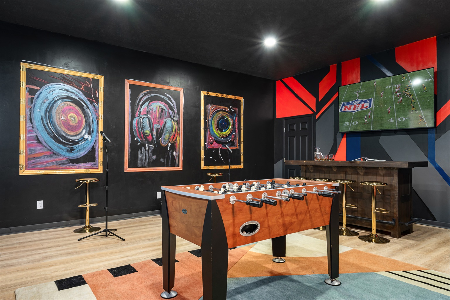 Bring the hype: karaoke, foosball, a giant TV, and a bold, art-driven game room made for late-night laughs.”