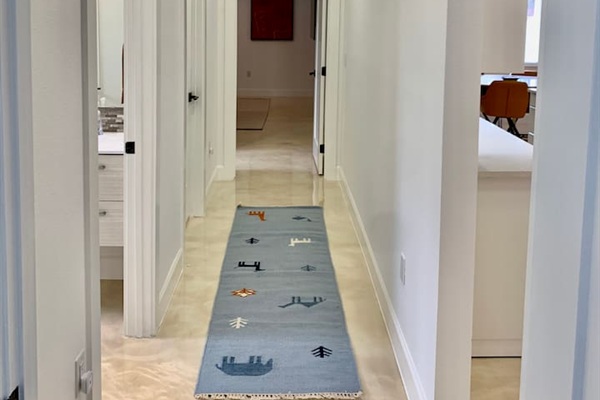 Hallway to 2nd Primary, Three Way Split Floor plan, privacy for each primary Suite.