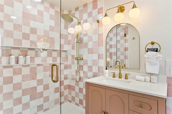 Master bathroom with glass shower and a separate soaking tub