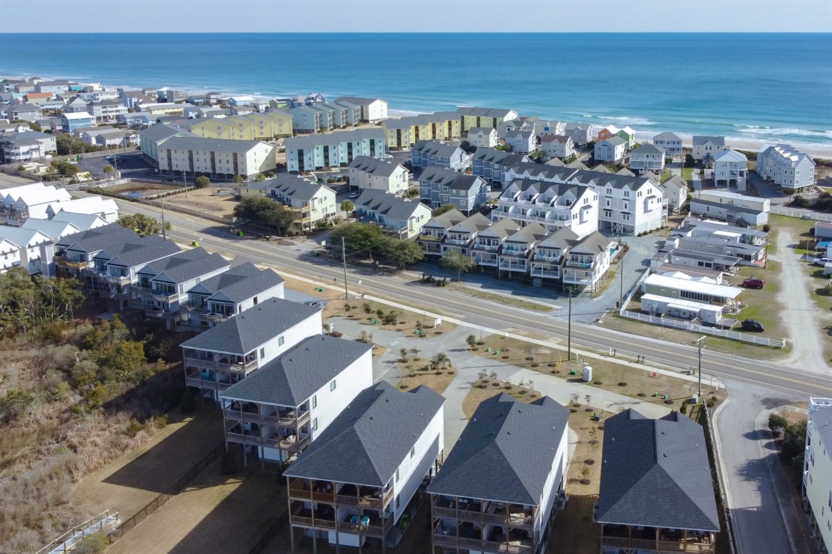 Bird&rsquo;s-eye view of your coastal getaway! Nestled in a peaceful neighborhood just steps from the shore
