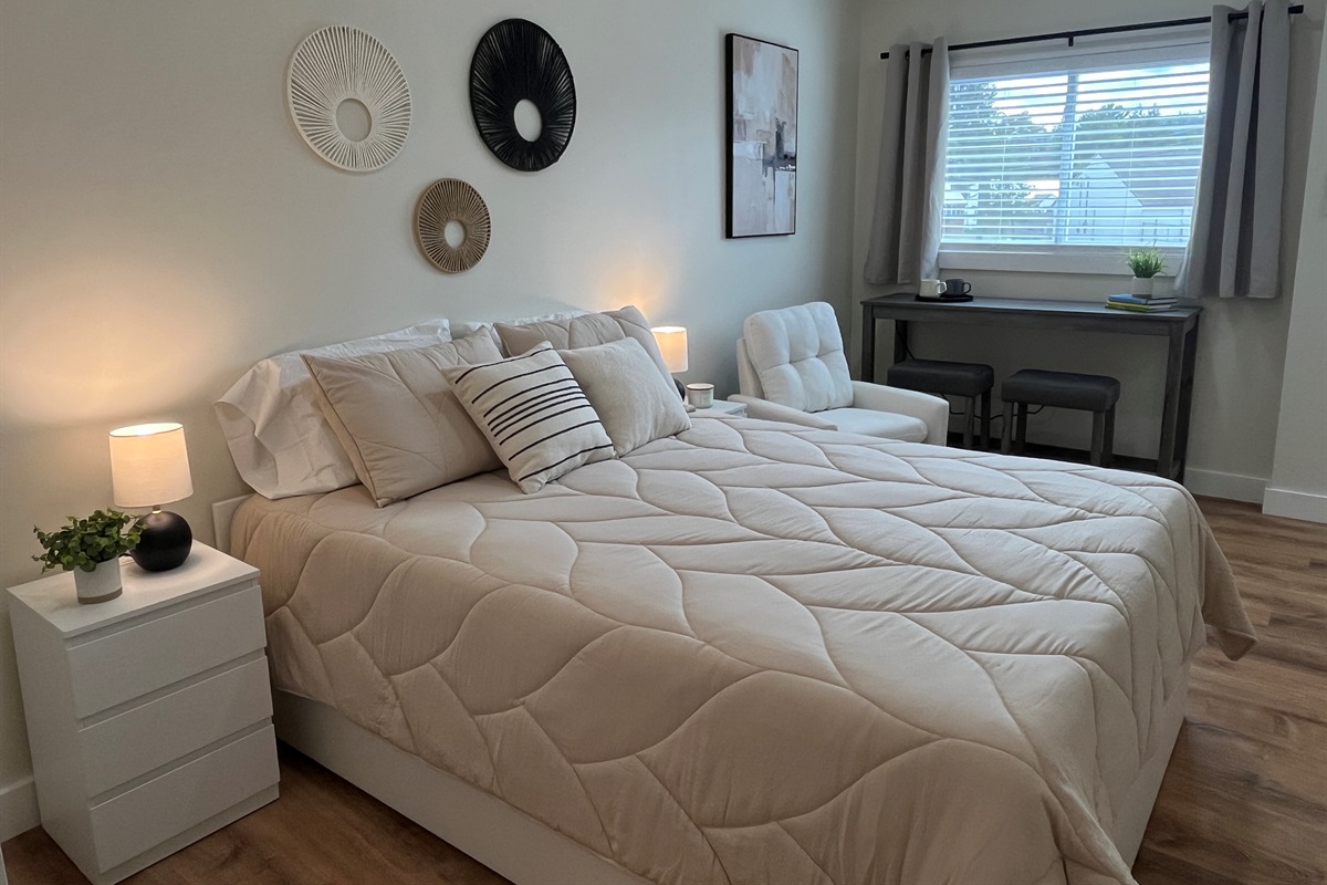 Queen bed and living area