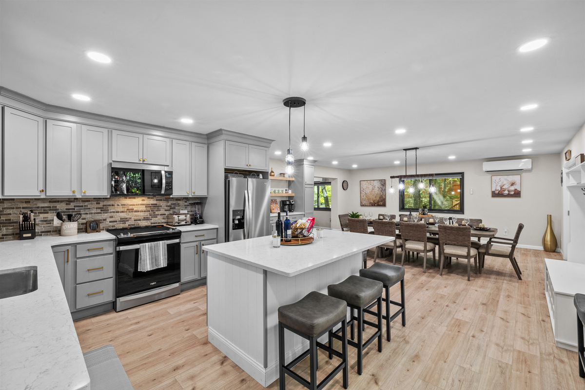A central island with extra prep space, convenient built-in power outlets,