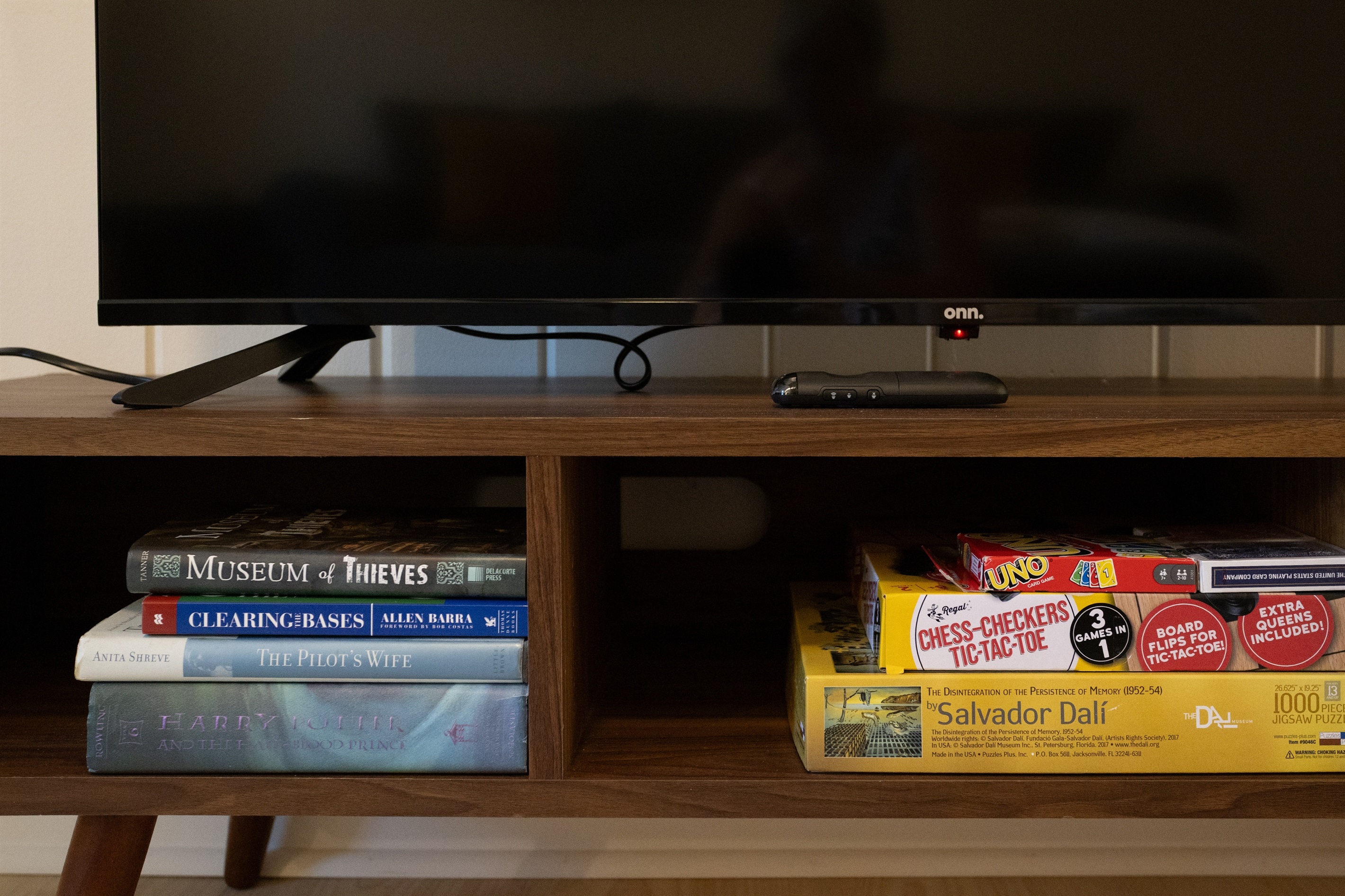 Unwind with a selection of games and books—perfect for a relaxing evening in.
