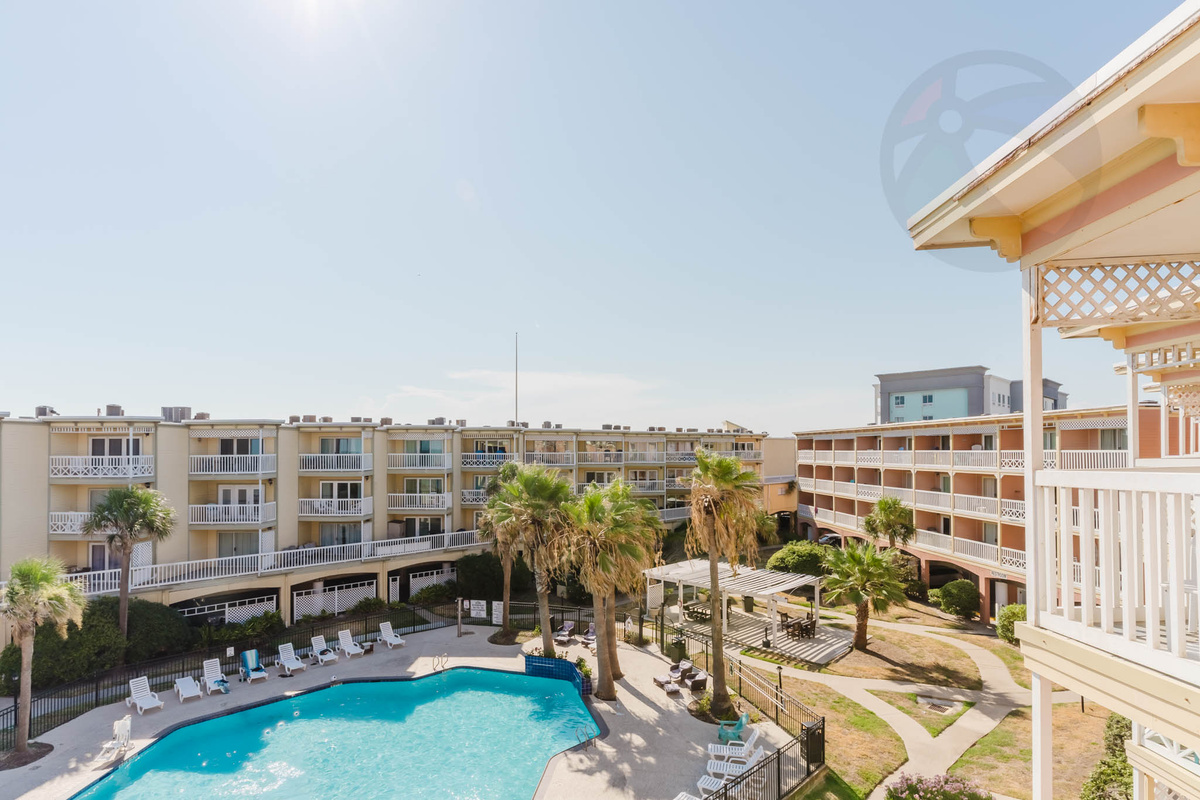 With a great view of one of the pools from the balcony