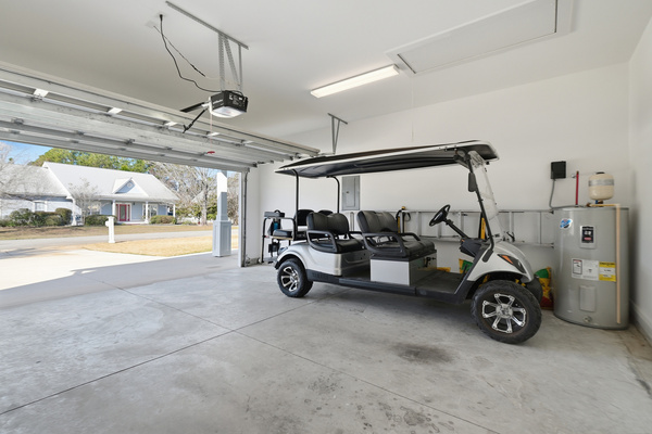Complimentary golf cart stored in the garage for easy trips to the nearby beach and county piers.